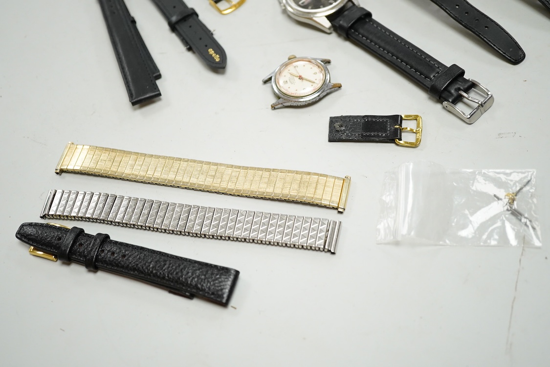 Four assorted wrist watches including two Roamer and a Seiko 5 automatic, a Military issue open faced stopwatch, a watch case opening tool, winding crown, two lug bars and five watch straps.
